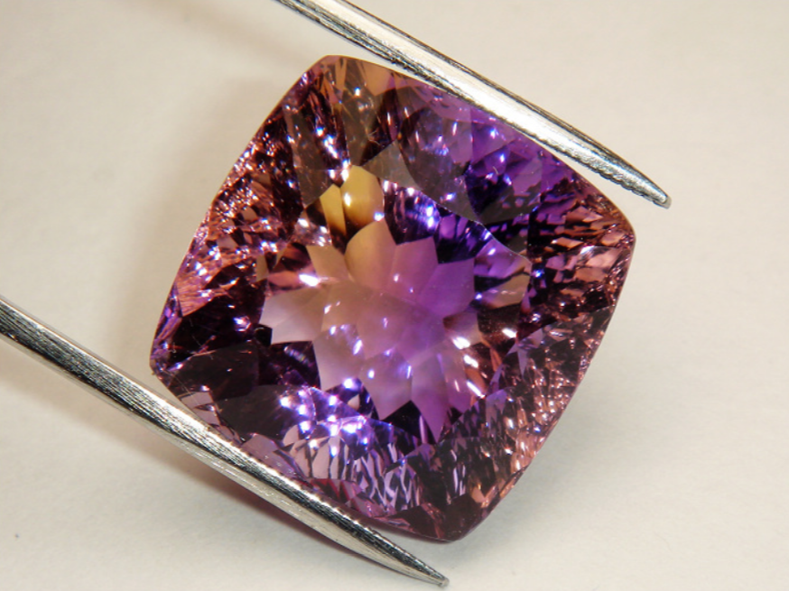 对紫黄晶你知道多少，紫黄晶的真假怎么去鉴别？